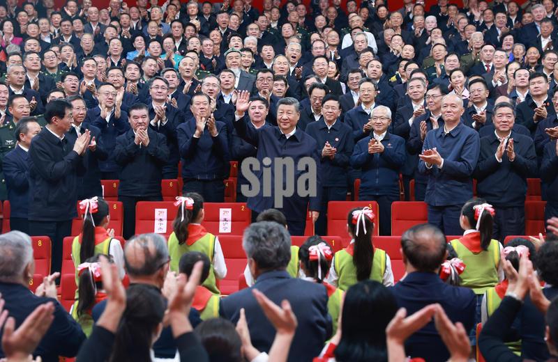 (250924) -- URUMQI, Sept. 24, 2025 (Xinhua) -- Chinese President Xi Jinping, also general secretary of the Communist Party of China Central Committee and chairman of the Central Military Commission, waves to people while attending a gala marking the 70th founding anniversary of Xinjiang Uygur Autonomous Region in Urumqi, the regional capital, on Sept. 24, 2025. Xi joined people of all ethnic groups in Xinjiang to watch the gala entitled "Beautiful Xinjiang." (Xinhua/Ding Lin) (Photo by Xinhua/Sipa USA)