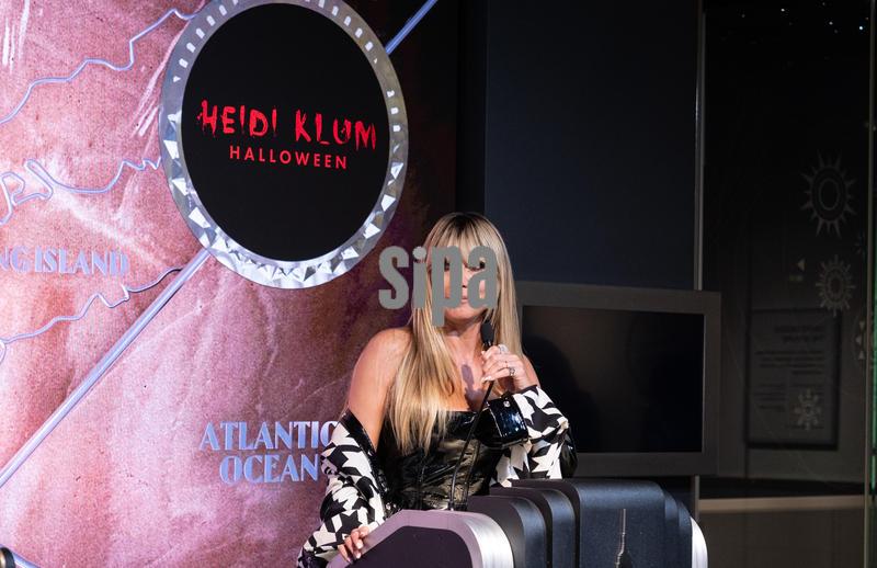 Heidi Klum lights up the Empire State Building to celebrate Halloween