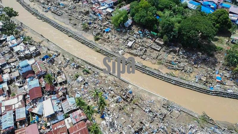 (251106) -- CEBU, Nov. 6, 2025 (Xinhua) -- An aerial drone photo taken on Nov. 6, 2025 shows a site devastated by the Typhoon Kalmaegi in Cebu Province, the Philippines. Philippine President Ferdinand Romualdez Marcos declared a state of national calamity due to the impact of Typhoon Kalmaegi and in anticipation of an upcoming typhoon, local media reported Thursday.
   Kalmaegi, the 20th typhoon to slam the Philippines this year, left the country on early Thursday morning, killing at least 140 people with 127 missing. (Philippine Red Cross/Handout via Xinhua) (Photo by Xinhua/Sipa USA)