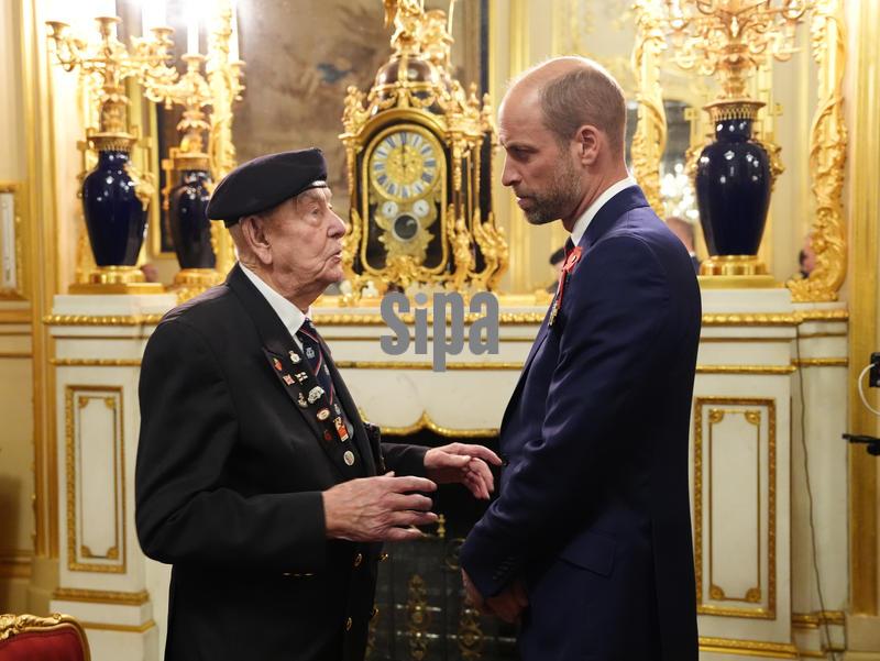 11/11/2025 - The Prince of Wales and veteran Henry Rice at a reception for veterans who served in the Pacific during the Second World War, part of the commemorations marking the 80th anniversary of VJ Day, at Windsor Castle, Berkshire. Picture date: Tuesday November 11, 2025. (Photo by Jonathan Brady/PA Images/Alamy Images/Sipa USA) *** US Rights Only ***