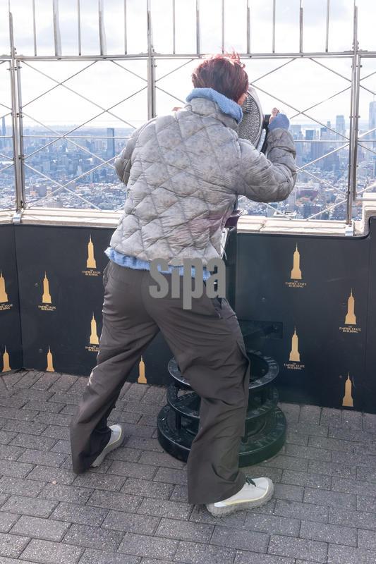 Wonho visits the Empire State Building to celebrate release of first full album, Syndrome