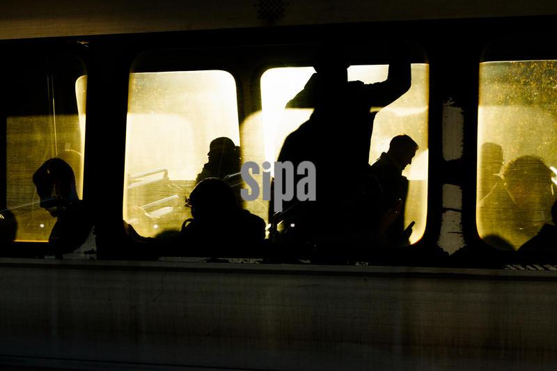 People commute on the metro at the Ronald Reagan National Airport stop on Thursday, November 13, 2025. (Photo by Aaron Schwartz/Sipa USA)