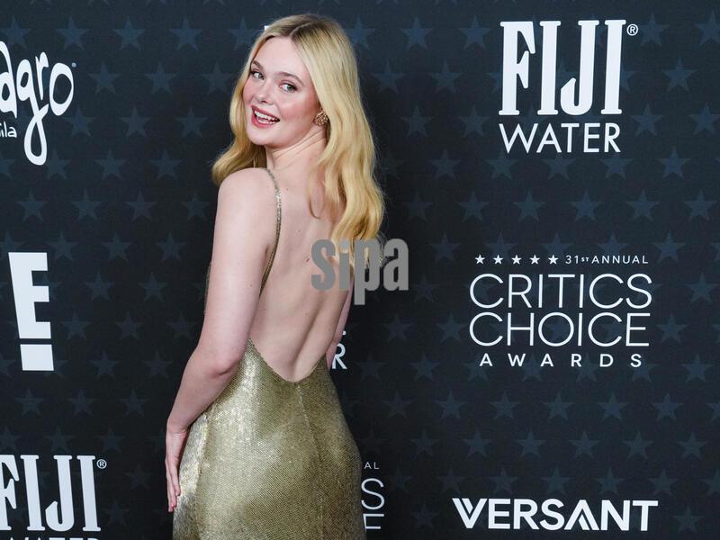 Elle Fanning walking on the red carpet at the 31st Annual Critics Choice Awards held at the The Barker Hangar in Santa Monica, CA on Friday, ​January 04, 2026. (Photo By Sthanlee B. Mirador/Sipa USA)