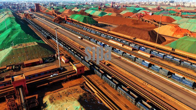 QINGDAO, CHINA - JANUARY 22, 2026 - Construction machinery is sorting and loading imported ore at the Qingdao Port Ore Terminal in Qingdao, Shandong Province, China on January 22, 2026. (Photo by CFOTO/Sipa USA)