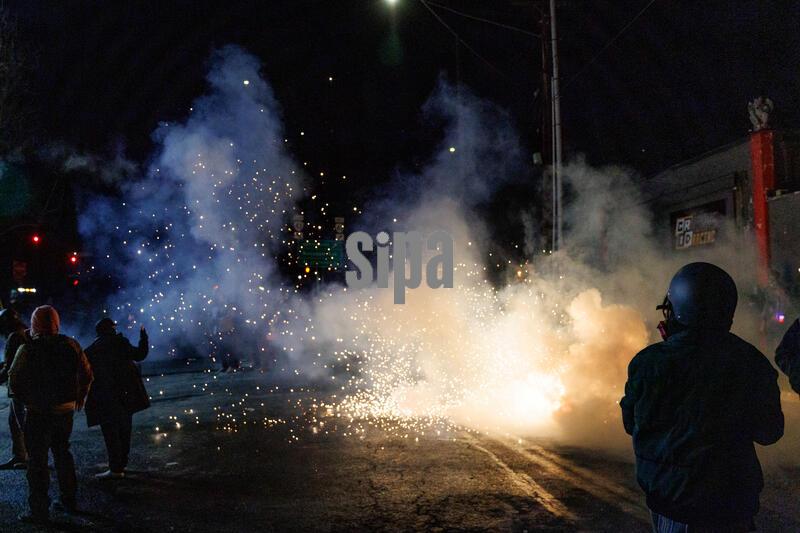 PORTLAND, OREGON USA - January 24, 2026 --  ICE agents unleash tear gas and flash bang grenades at protesters.  Furious protests erupted in Portland over the killing in Minneapolis this morning of Alex Pretti, an ICU nurse, who was shot dead today by Immigration and Customs Enforcement (ICE) agents.


(Photo by John Rudoff/Sipa USA)