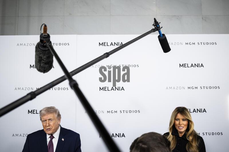 President Donald Trump and First Lady Melania Trump speak to media while arriving at the world premier of the Amazon MGM Studio film MELANIA, at the John F. Kennedy Memorial Center for the Performing Arts, in Washington, D.C., on Thursday, January 29, 2026. (Graeme Sloan/Sipa USA)