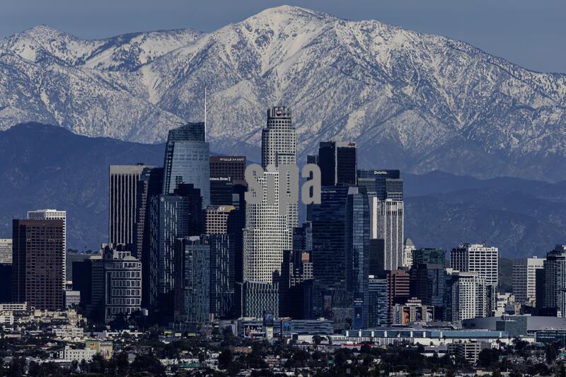 The downtown Los Angeles skyline with snow capped Mt .Baldy of the San Gabriel Mountain range behind it.
2/22/23 Los Angeles, CA., USA
(Photo by Ted Soqui/SIPA USA)
