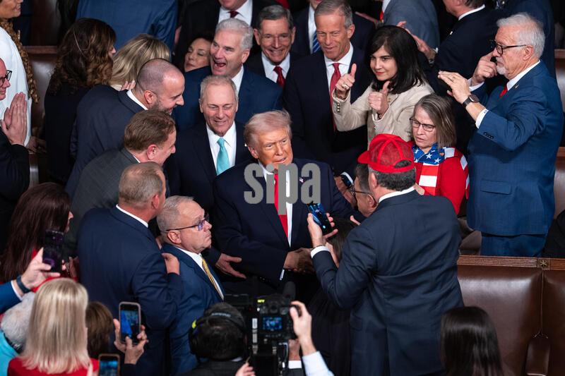 United States President Donald J. Trump arrives to the House Chamber ahead of the State of the Union address on Tuesday, February 24. (Photo by Aaron Schwartz/Sipa USA)