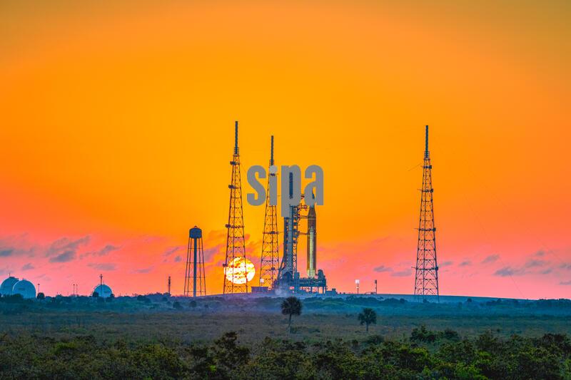 NASAs Artemis II Space Launch System (SLS) rocket sits on Pad 39b during sunrise before launch, (Photo by Alex G Perez/AGPfoto/Sipa USA)