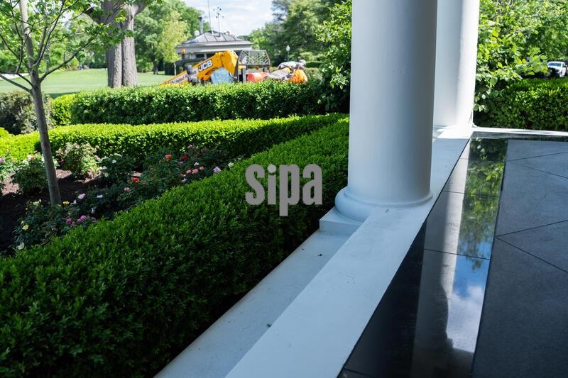 Trump Unveils New Black Granite White HouseColonnade