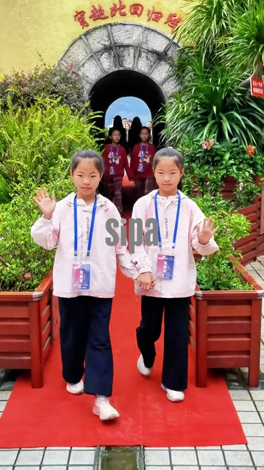 China: Twins from around globe gather for festival in Pu'er