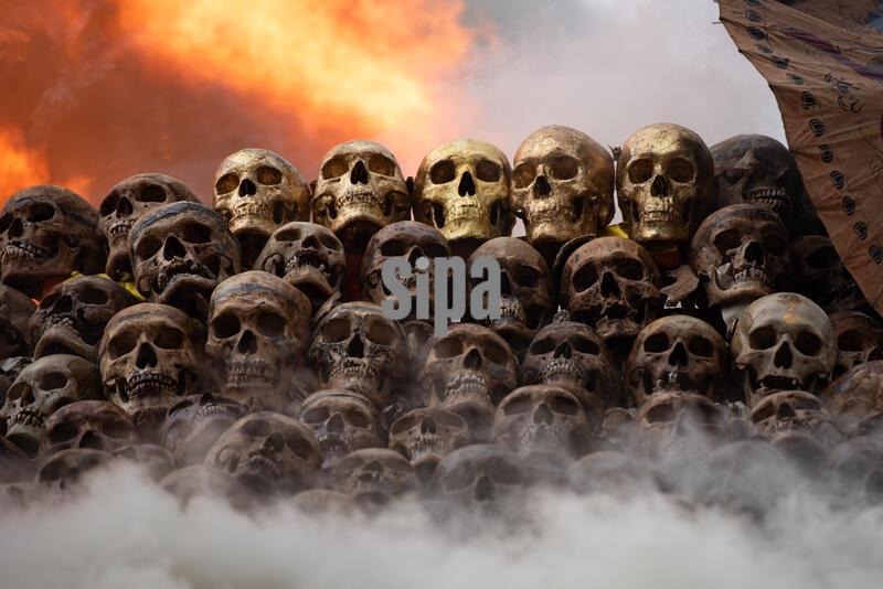CHONBURI, THAILAND May 4, 2026: (EDITOR'S NOTE: Image depicts death) View of Smoke and fire consumed the mound of human skulls in a cremation rite, performed as part of a traditional 'Lang Pa Cha' at Tri Kunnatham Foundation in Chonburi Province, eastern Thailand. The ceremony, rooted in long-standing Chinese-Thai beliefs, involves the exhumation and ritual cremation of unclaimed bodies to find spiritual rest for the deceased. (Photo by Teera Noisakran/SipaUSA)