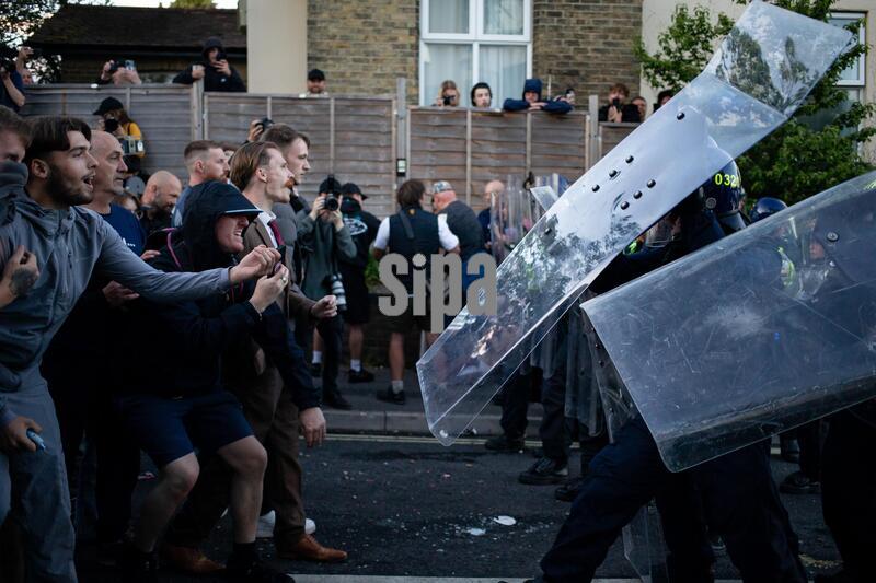 Riot police push forward with shields as violent clashes erupt as protesters gather to express their anger at the murder of Henry Nowak following the release of police bodycam footage which shows Nowak handcuffed and arrested whilst telling police he had been stabbed and couldn’t breathe. Vickrum Digwa, was jailed for Nowak's murder and was sentenced to life in prison. Digwa had lied to police at the scene, stating he had been the victim of a racist attack. (Photo by Christopher Walls / SOPA Images/Sipa USA)