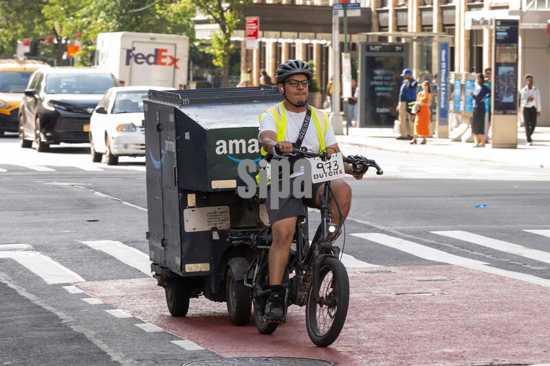 Amazon Uses Electric Powered Bicycle For Deliveries, New York, USA - 11 Jun 2026