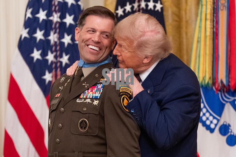 United States President Donald Trump awards Major Nicholas Dockery the Medal of Honor during a ceremony in the East Room of the White House in Washington, DC, USA, on Thursday, June 18, 2026.
Credit: Aaron Schwartz / Pool/Sipa USA