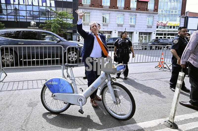 Congressional candidate Brad Lander arrives by bike to 'Our Team, Our Year' Get Out The Vote (GOTV) rally hosted by Sen. Bernie Sanders and New York City Mayor Zohran Mamdan for rally in support of local candidates ahead of next week's Primary Elections, at the Kings Theatre in the Brooklyn borough of New York City, NY, June 18, 2026. (Photo by Anthony Behar/SipaUSA)