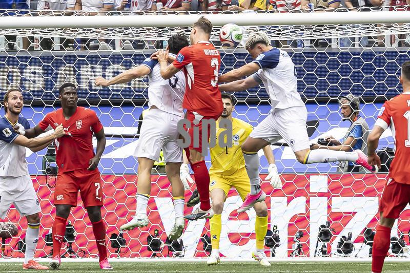 Bosnia and Herzegovina Defender Tarik Muharemovic (4) heads the ball during the Switzerland vs. Bosnia and Herzegovina First Stage - Group B match of the 2026 FIFA World Cup at SoFi Stadium in Inglewood, CA on June 18, 2026. (Photo by Corine Solberg/Sipa USA)