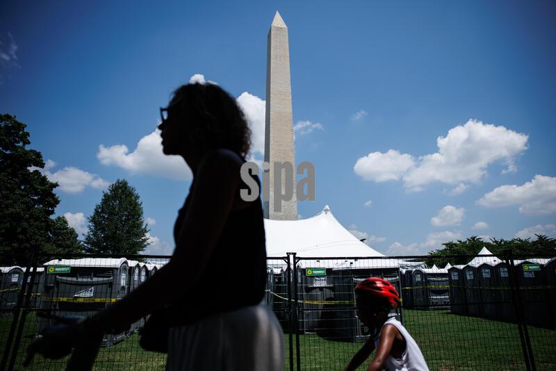 Hundreds to tents and thousands of portable toilets are set up on the National Mall near the Washington Monument for the Freedom 250 Salute To America Celebration & Fireworks ahead of 4th of July celebrations marking the 250th anniversary of the United States on July 1, 2026 in Washington, D.C. (Photo by Samuel Corum/Sipa USA)