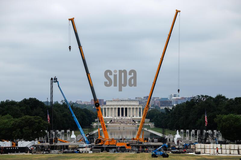 Workers dismantle the stage and facilities from the Freedom 250 “Salute to America" Independence Day celebrations near the Washington Monument on July 8, 2026 in Washington, D.C. The celebrations marking the 250th anniversary of the adoption of the Declaration of Independence were almost canceled when a severe storm passed nearby forcing officials to evacuate the National Mall but the massive 40 minute fireworks display eventually kicked off before midnight on July 4th. (Photo by Samuel Corum/Sipa USA)