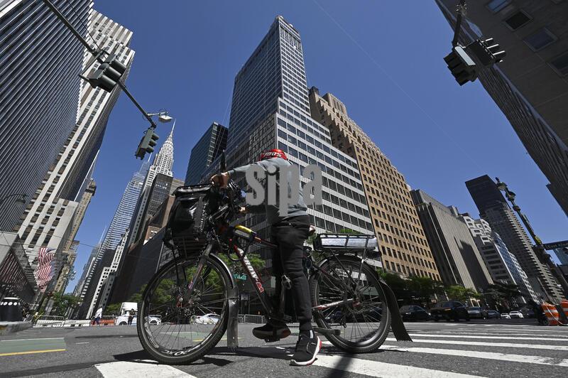 Exterior view of the former Pfizer Headquarters on 42nd Street and Second Avenue where support columns inside the building buckled under the weight of contruction have been stabalized, New York, NY, July 8, 2026. Evacuated residents and hotel guests have been allowed to return as the damaged high-rise which is going through an office-to-residential conversion is being inspected by the city. (Photo by Anthony Behar/SipaUSA) 
