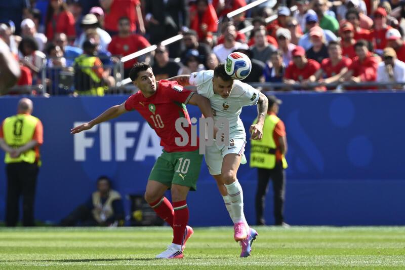 France defender Lucas Digne #3 heads the ball against Morocco midfielder Brahim Diaz #10 during the first half at the FIFA World Cup 2026 match at Boston Stadium, in Foxborough, Massachusetts on July 9, 2026.  (Photo by Eric Canha/Sipa USA)
