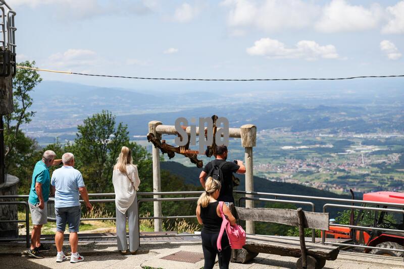 People hike on Sljeme to escape summer heat