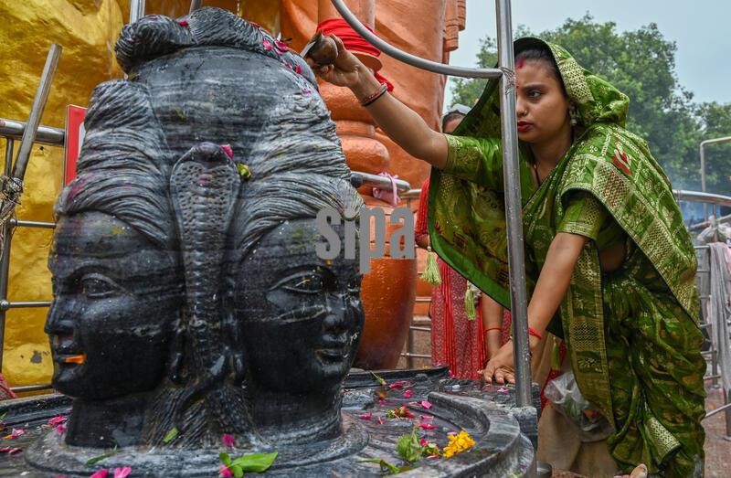 India: Devotees Throng Shiva Temples On Occasion Of Shravan Shivratri Festival