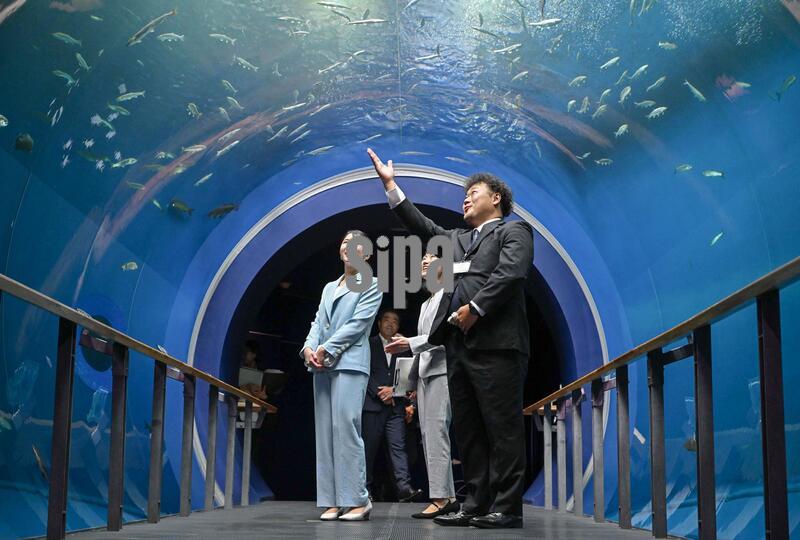 Japanese Princess Aiko (L) visits Lake Biwa Museum in Kusatsu in Shiga Prefecture, western Japan, on Aug. 21, 2026. (Pool photo) (Photo by Kyodo News/Sipa USA)
