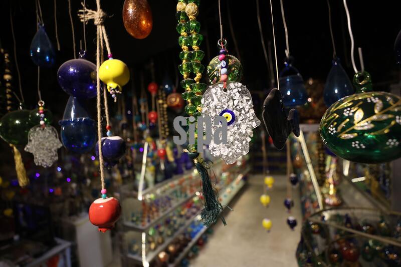Palestinian craftsman resumes work at glass factory in Hebron