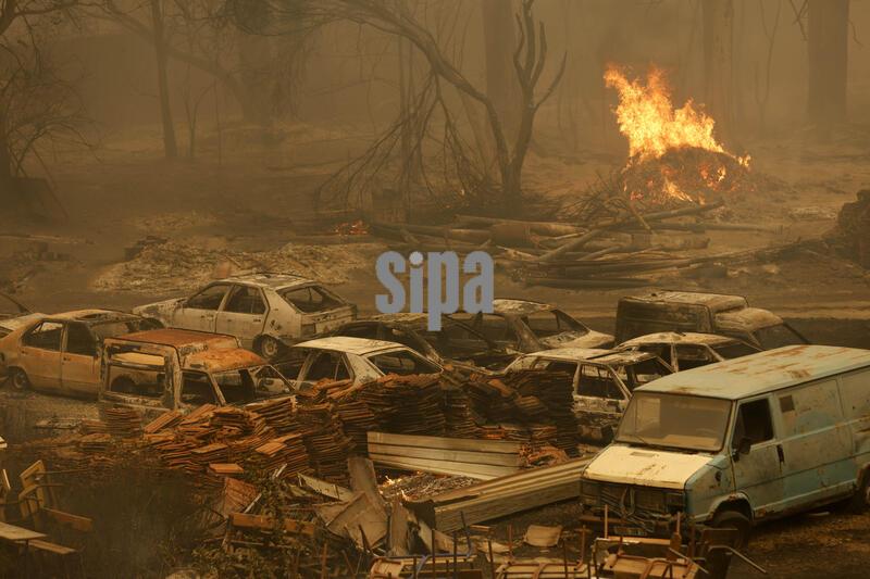 (260827) -- ALGIERS, Aug. 27, 2026 (Xinhua) -- Photo taken on Aug. 27, 2026 shows the aftermath of wildfires in a village in the mountains of Jijel, northeastern Algeria. At least 12 people were killed in wildfires that swept three provinces in northeastern Algeria, Interior Minister Said Sayoud said Wednesday evening. (Photo by Billel Bensalem/Xinhua) (Photo by Xinhua/Sipa USA)