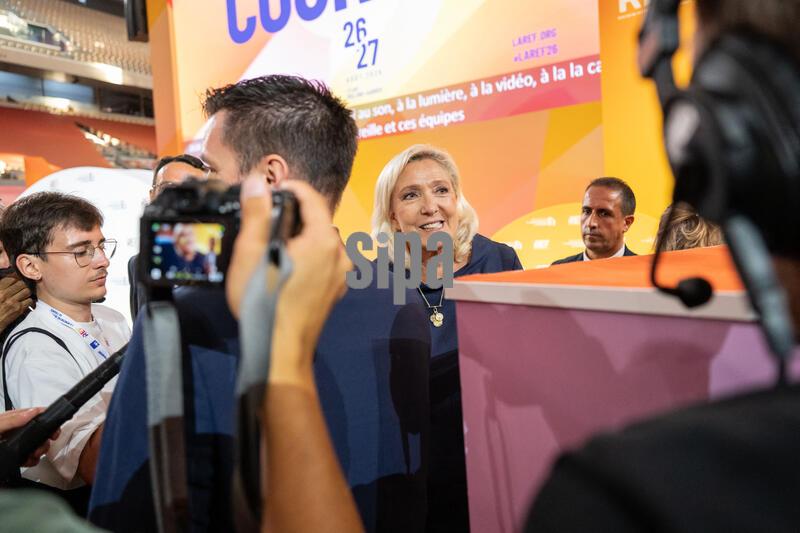 President of Rassemblement National parliamentary group Marine Le Pen leaves after a debate opposing 7 candidates for the 2027 French presidential election, on the second day of La REF 2026 meeting of French entrepreneurs, organised by the MEDEF, at the Philippe Chatrier tennis court at Roland-Garros venue in Paris, France on August 27, 2026. Photo by Alexis Jumeau/Abaca/Sipa USA