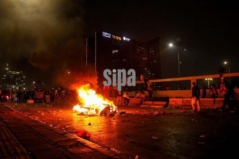 Protesters demand anti-corruption measures outside Indonesian parliament in Jakarta