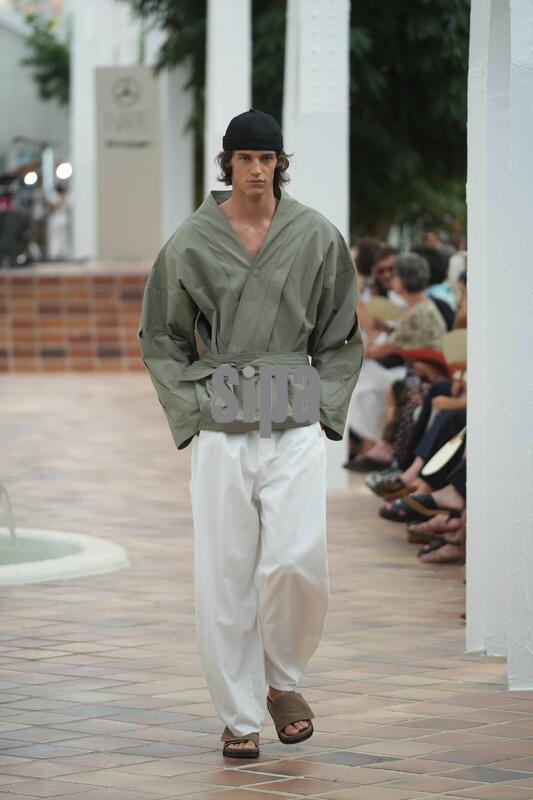 Spain: A model wears at collection runway a creation from “ Adolfo Dominguez“ during Pasarela Cibeles Mercedes-Benz Fashion