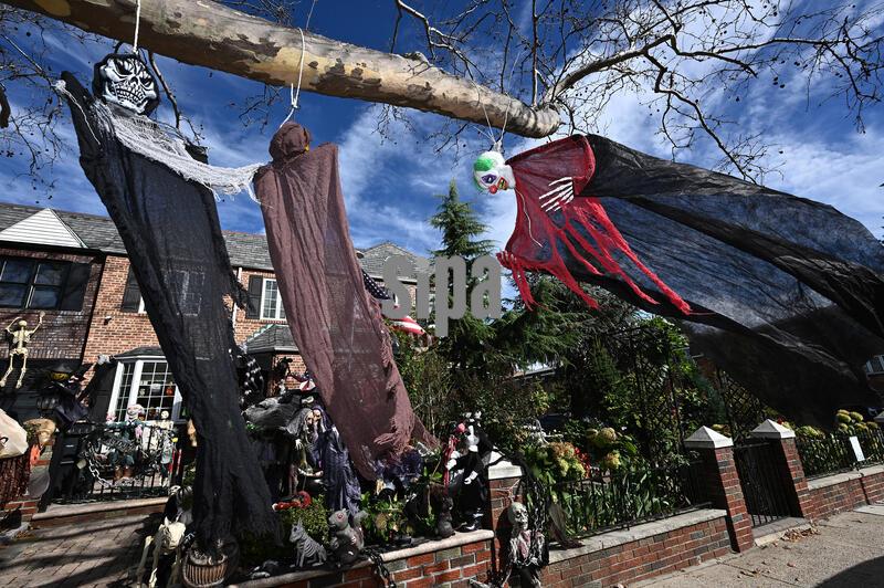 Homeowners decorate the outside of their homes in preparation for Halloween, in the New York City borough of Queens, October 2, 2026. (Photo by Anthony Behar/Sipa USA)