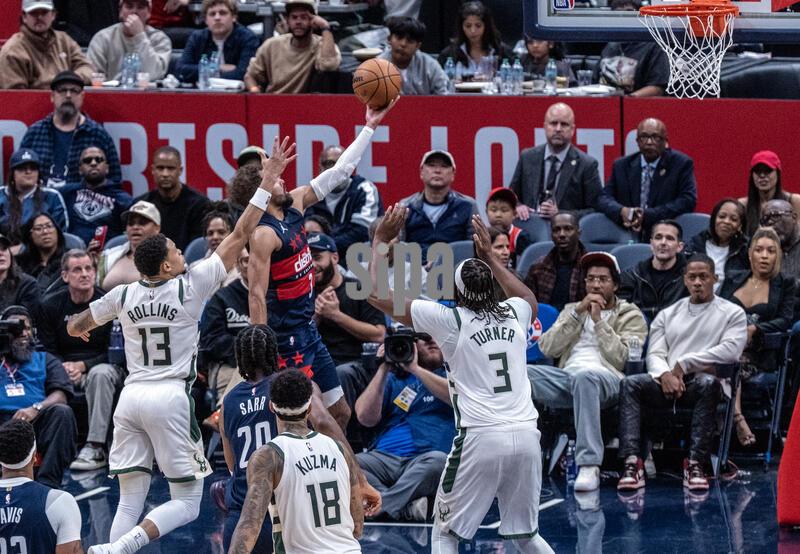 WASHINGTON, DC - OCTOBER 21: Washington Wizards guard Trae Young (3) reaches up for a score during a NBA game between the Washington Wizards and the Milwaukee Bucks, on October 21, 2026, at Capital One Arena, in Washington, DC.
 (Photo by Tony Quinn/SipaUSA)