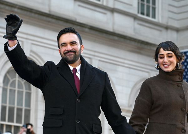 New York City Mayor Zohran Mamdani and his wife Rama Duwaji stand on the steps of City Hall after being sworn during his public inauguration ceremony, New York, NY, January 1, 2026. Mamdani, who was officially sworn in at midnight by New York State Attorney General Letitia James, is New York City's first Muslim and first person of South Asian descent to serve as New York City Mayor.