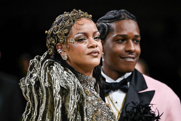 Rihanna and A$AP Rocky walking on the red carpet at the 2026 Metropolitan Museum of Art Costume Institute Gala celebrating the opening of the exhibition titled “Costume Art” held at the Metropolitan Museum of Art in New York, NY on May 4, 2026. (Photo by Anthony Behar/Sipa USA)