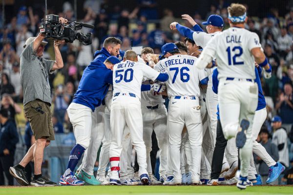The Los Angeles Dodgers celebrate on a walk off home run by first baseman Freddie Freeman (5) during a MLB game against the Los Angeles Angels, Friday, June 5, 2026, at Dodger Stadium, in Los Angeles, CA. The Dodgers defeated the Angels 1-0.
