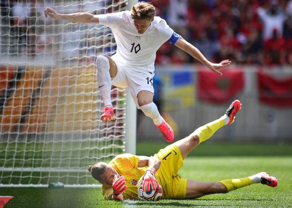 While playing defense, Norway defender David Moller Wolfe (10) jumps over Norway goalkeeper Orjan Nyland (1) as he makes a save during the FIFA International Friendly Match: Morocco vs Norway at Sports Illustrated Stadium on Sunday, June 7, 2026; Harrison, New Jersey, USA. (Photo by Jess Stiles/Sipa USA)